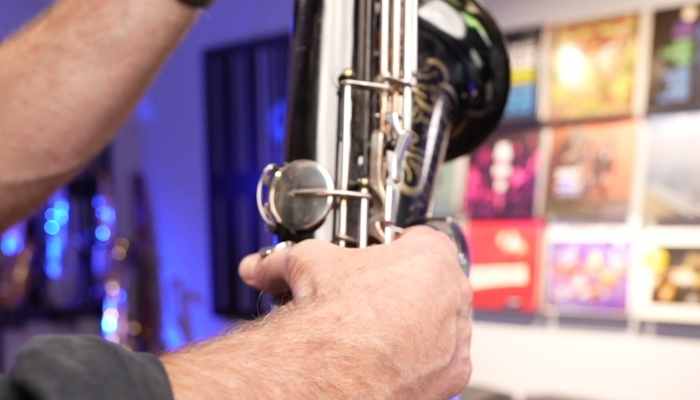 Hold your tenor saxophone with right thumb under the hook. Sax School Online